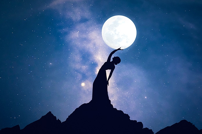 people-silhouette-touching-moon-2